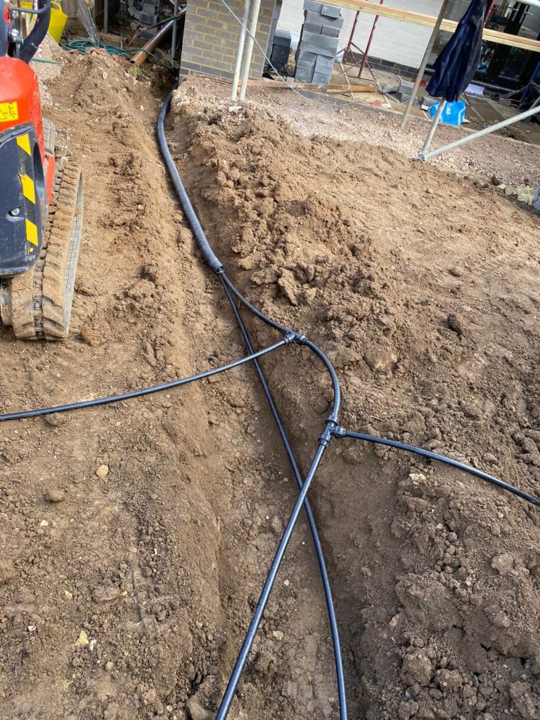 Digging Irrigation Trenches and installing pipework