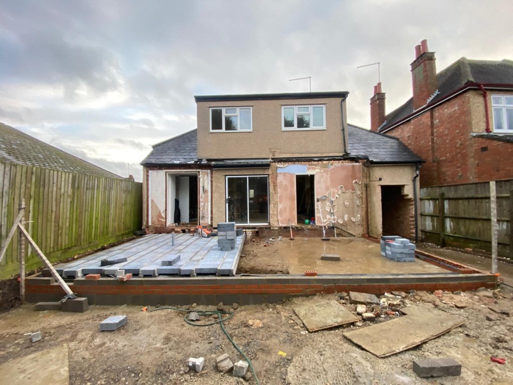 Old-extension-demolished-and-footings-poured-and-brickwork-built-up-to-beam-floor-level